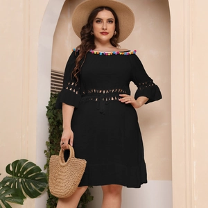 Off-shoulder black beach dress with colorful tassels and hollow-out knit details
