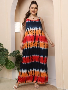 Detail view of plus size tie-dye maxi dress with colorful stripes and thin straps