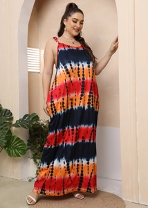 Detailed view of colorful tie-dye patterns on a loose bohemian maxi sundress fabric