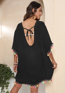 Boho black beach cover-up dress featuring vibrant multi-color tassel trim and backless tie design