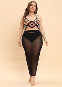 Plus size bohemian two-piece set with colorful crochet halter top and black mesh maxi skirt