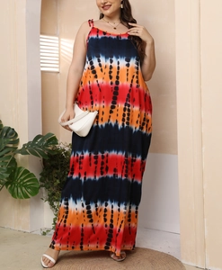 Plus size maxi dress with colorful tie-dye stripes and camisole straps for summer