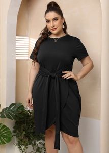 Detail of plus size black short sleeve dress featuring adjustable waist tie and cross hem