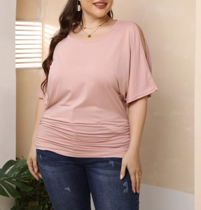 Detail of pink cold shoulder plus size top with stylish ruched front and soft fabric