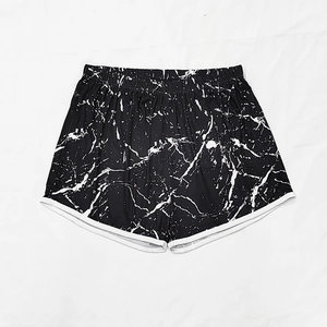Women's marble print beach shorts with elastic waist and white trim detail