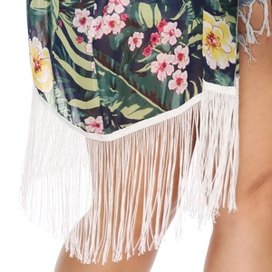 Close-up of tropical floral print chiffon cover-up with long white fringe tassels detail