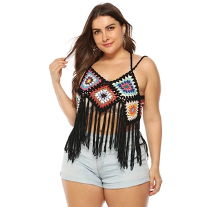 Detail of bohemian crochet bikini top with colorful patterns and long black tassels