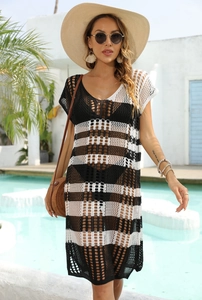 Detail of crochet hollow-out stripe pattern and V-neckline on women's beach cover-up