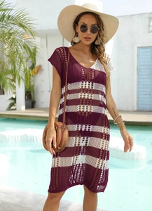 Detail of purple and white striped crochet beach cover-up with hollow knit texture