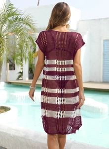 Rear view of long crochet beach cover-up with wine red and white stripes by the pool