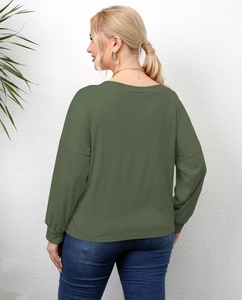 Detail view of the olive green long sleeve top back with dropped shoulder design