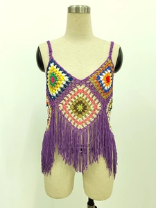 Detail of bohemian handmade crochet tank top featuring colorful patchwork and purple fringe