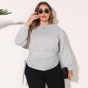Detail of grey plus size sweatshirt featuring adjustable gathered waist and ruched fabric texture