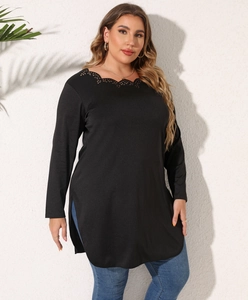 Detail of laser-cut hollow neckline and side split hem on this women's long sleeve top