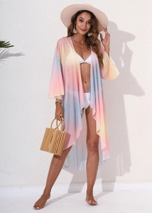 Detailed texture of semi-transparent gradient mesh fabric on this beach cover-up cardigan