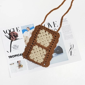 Handmade crochet crossbody phone bag in brown and beige knit with woven strap