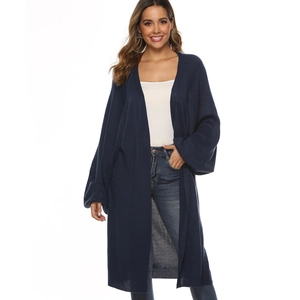 Full-body view of a long navy blue knitted cardigan with wide sleeves and open front
