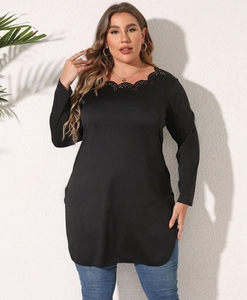 Detail of laser-cut scalloped neckline on black plus-size long sleeve tunic top