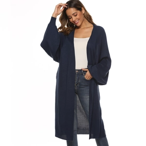 Detailed front view of long navy blue knit cardigan with wide batwing sleeves and ribbed cuffs