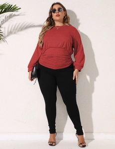 Detail view of brick red plus size sweatshirt featuring adjustable pleated waist and fabric texture