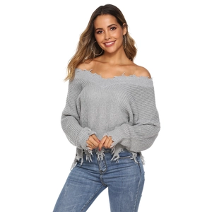 Women's V-neck knit sweater in grey with irregular fringe details and distressed edges