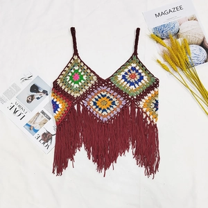 Handmade crochet camisole with colorful geometric patterns and deep red fringe tassels
