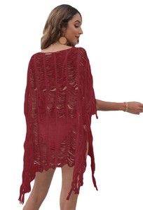 Deep red crochet beach cover-up with bohemian tassel fringe and hollow knit design