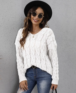 Detail of white cable knit texture on women's loose V-neck hooded sweater with soft fabric