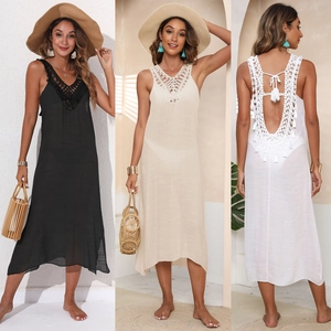 Detailed knit crochet beach cover-up with open back and fringed tassels in three colors