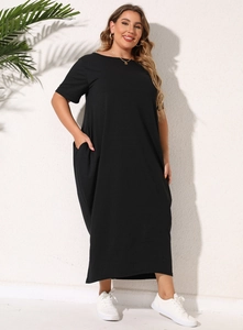 Detail of plus size black short sleeve maxi dress featuring practical side pockets
