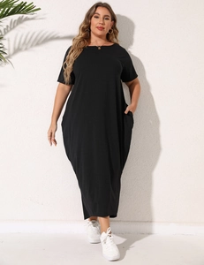 Plus size short sleeve black maxi dress with side pockets and asymmetrical hem design