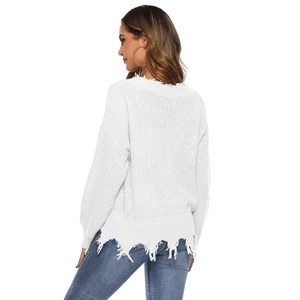 White V-neck distressed knit sweater with fringe hem and dropped shoulders for women