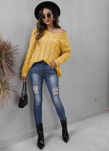 Chunky cable knit sweater for women with oversized V-neck and casual hood design