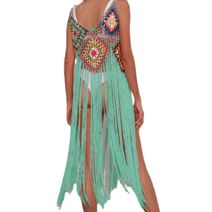 Handmade crochet bohemian beach cover-up with colorful patchwork and long mint fringe