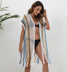 Women's crochet beach cover up with colorful vertical stripes and long fringe hem
