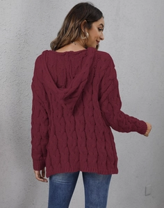 Detailed back view of a thick wine red cable knit sweater with a cozy hood design