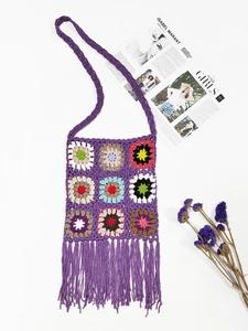Detail of colorful crochet granny square crossbody bag with long purple tassels