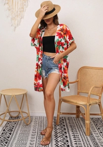 Women floral print beach cover up cardigan styled with bohemian summer vacation outfit