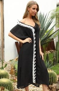Sexy black deep V-neck beach maxi dress with white contrast bohemian braided trim