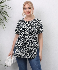 Detail view of plus size short sleeve leopard print top with side slits and round neck