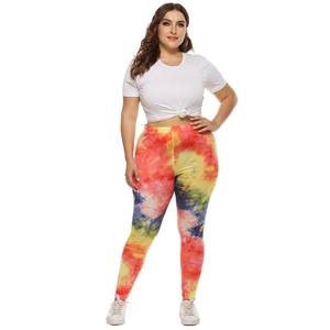 Front view of women plus size slim leggings with colorful irregular tie-dye print patterns
