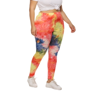 Detail of colorful tie-dye patterns and high-elastic fabric on slim leggings