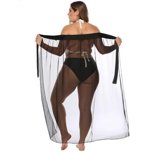 Detailed back view of a black sheer mesh beach cover-up skirt with a waist tie design