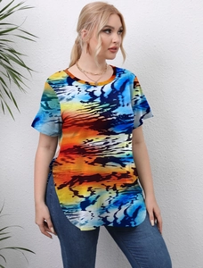 Detail of colorful abstract art print on a plus size women's round neck split hem top