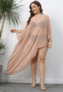 Detailed view of sheer mesh cover-up with asymmetrical hem and light beige mesh texture
