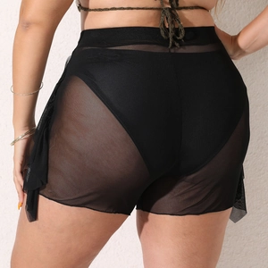 Close-up back view of black sheer mesh ruffle beach shorts with elastic high waist