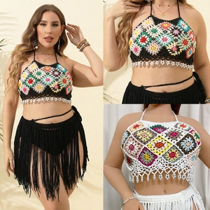 Detailed view of handmade boho crochet halter top with colorful granny squares and beads