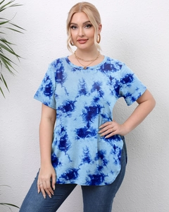 Detail of blue and white tie-dye T-shirt showing round neck and side slit hem design