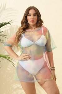 Detail of plus size rainbow tie-dye mesh beach cover-up showing light translucent fabric