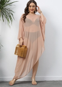 Macro detail of sheer peach chiffon beach cover-up with irregular hem and flowy texture